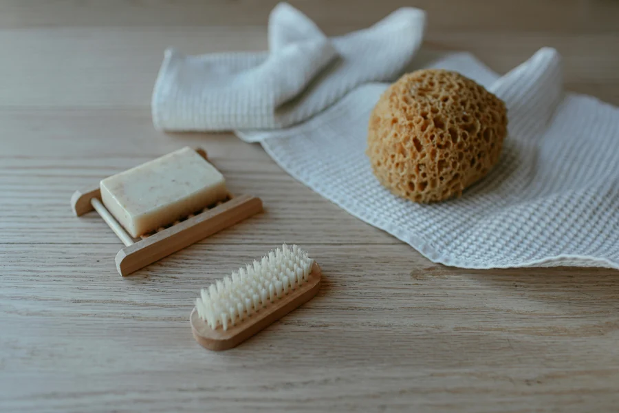 Natural soap, sponge, and linen towel flatlay